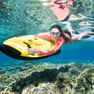 Girl underwater while using a Seabob